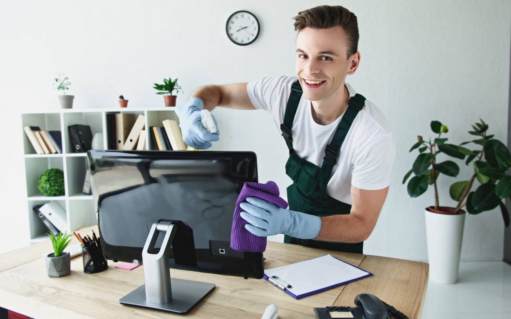 handsome-young-cleaner-in-rubber-gloves-cleaning-c-2021-09-01-01-56-48-utc.jpg